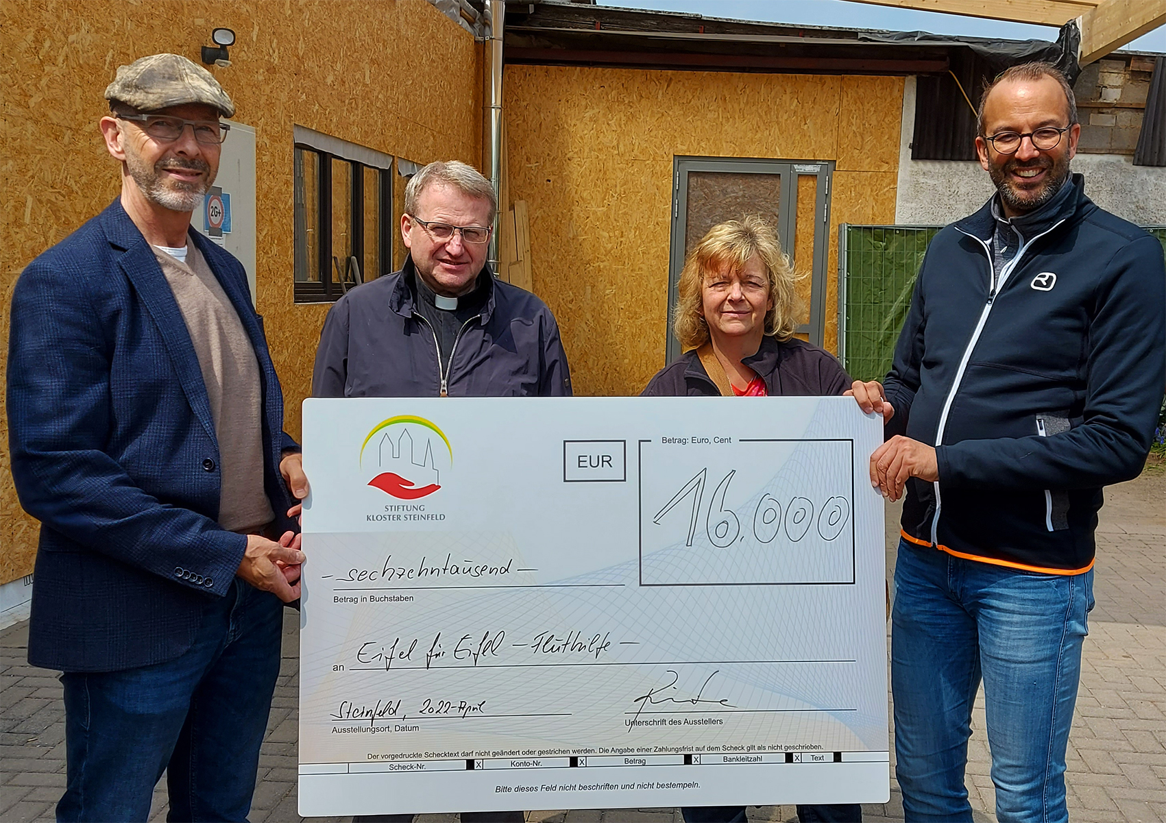 Cheque presentation - support for flood victim aid